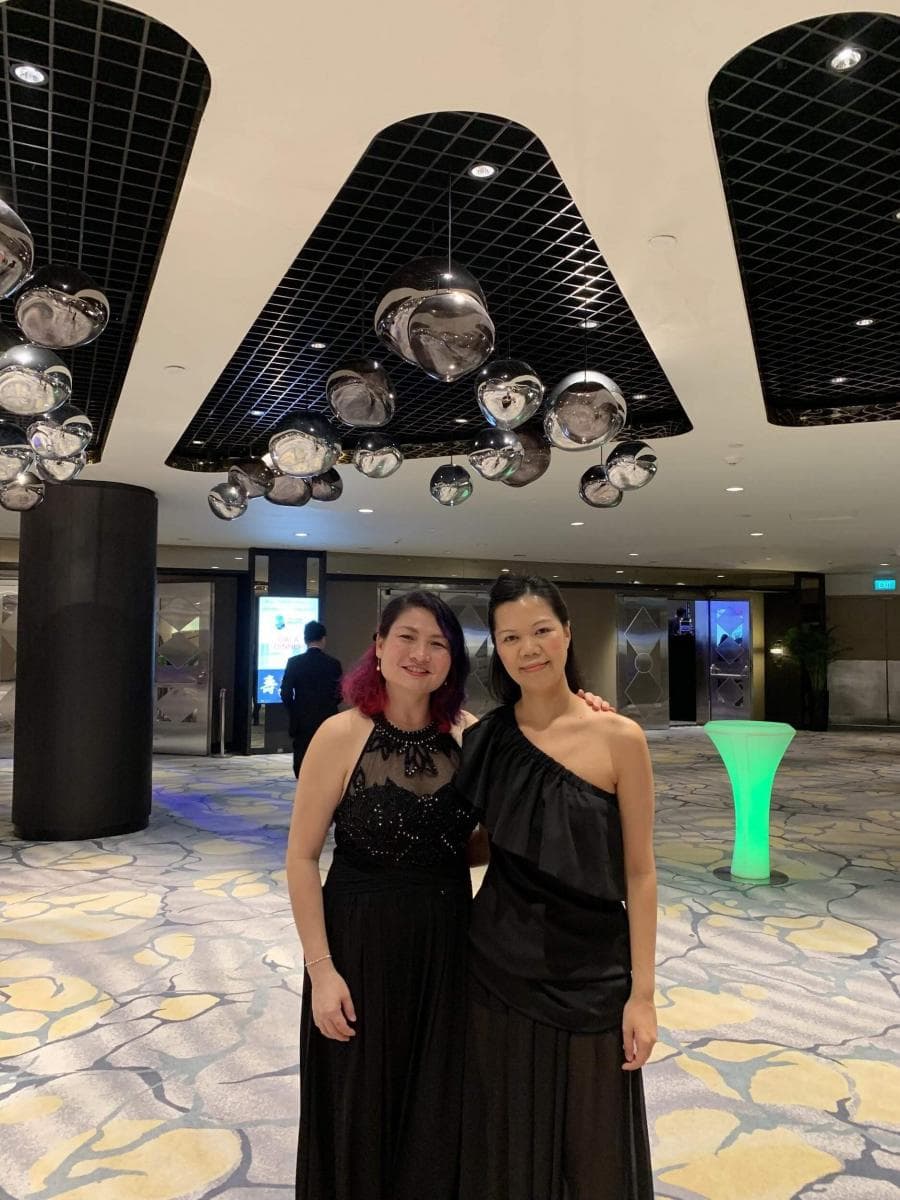 Elaine with a fellow musician at an evening performance