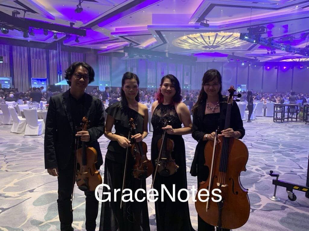 GraceNotes Music Collective performing at an evening function